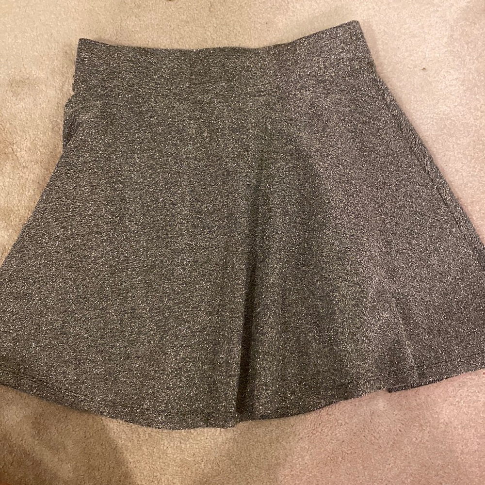 Mini skirt, platinum color.